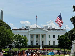 A giant US flag flies on a newly-installed flagpole on the North Lawn of the White House in Washington DC